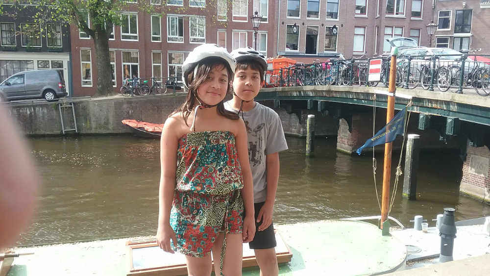 kids ready to ride on a canal in the netherlands