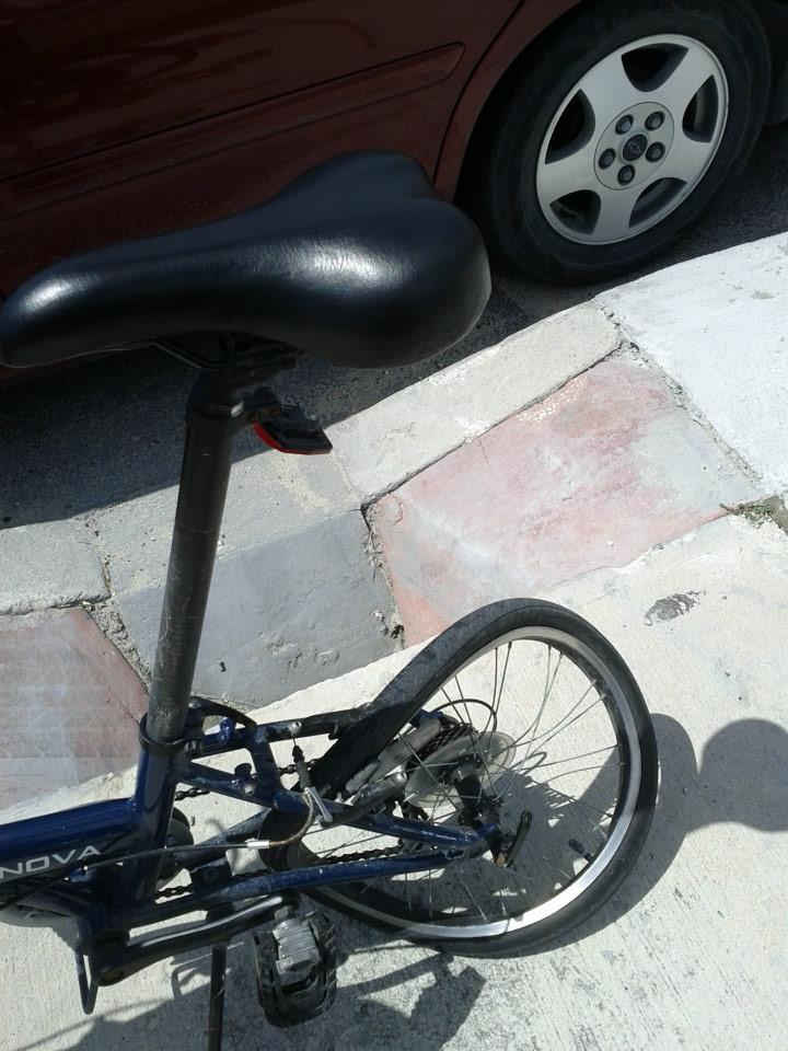 bicycle rear wheel broken from car accident